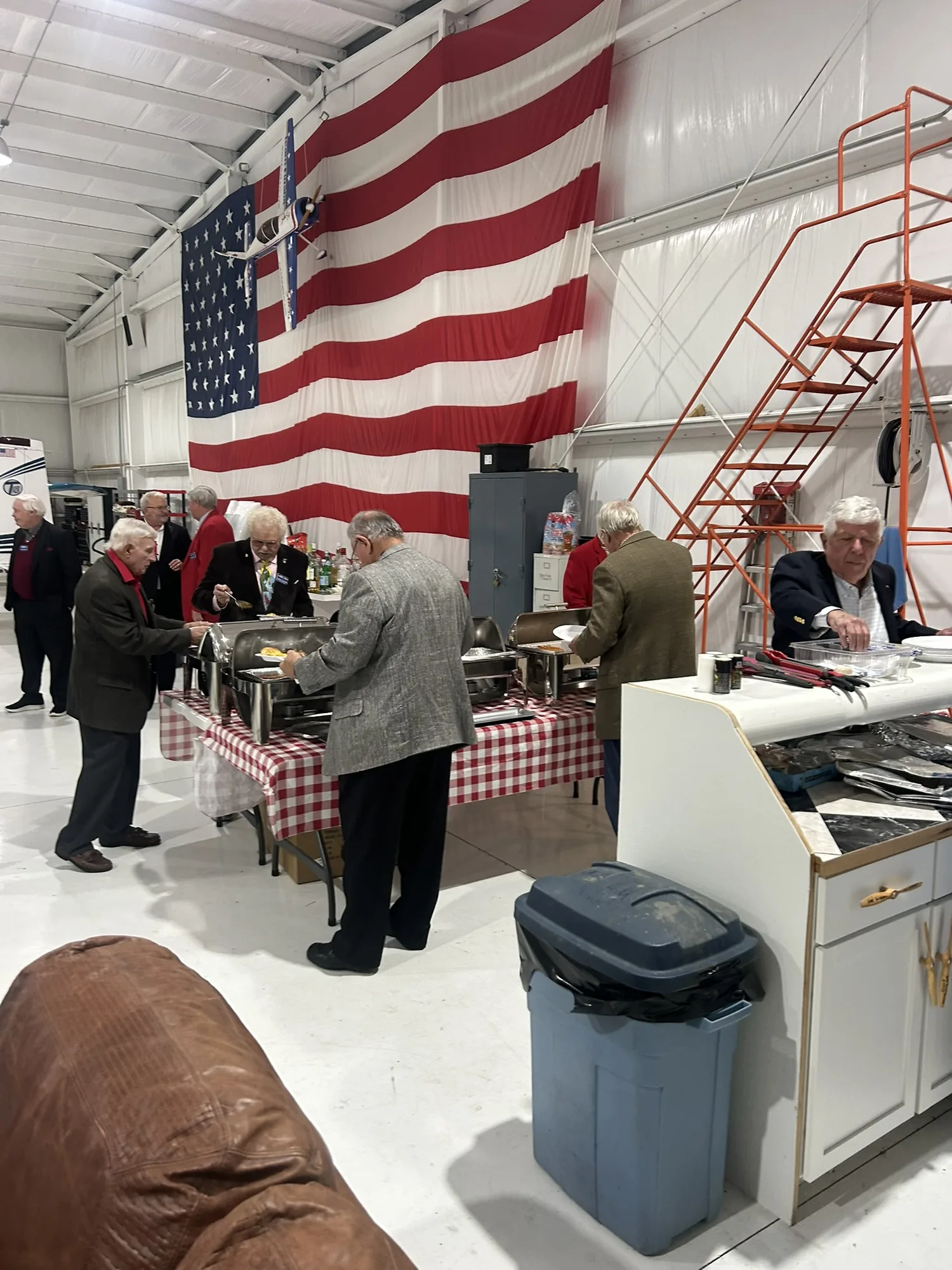 Corporate event buffet catered in a hangar